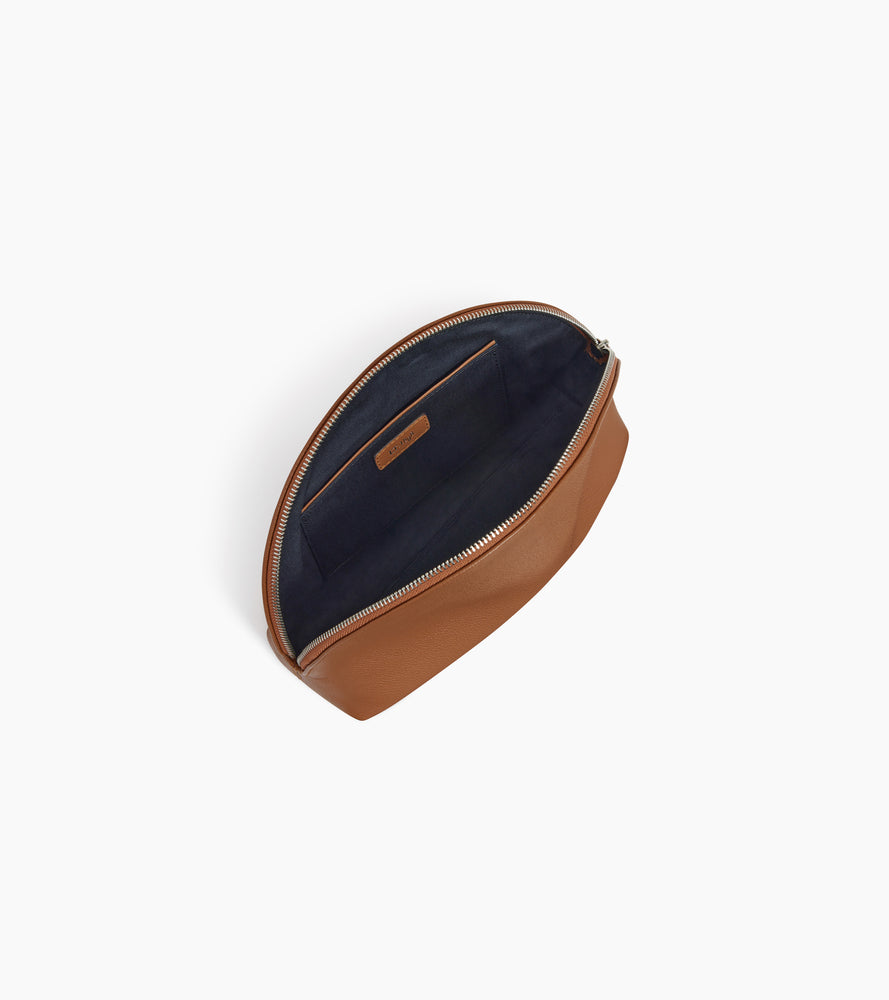 Half-moon toiletry bag in grained leather